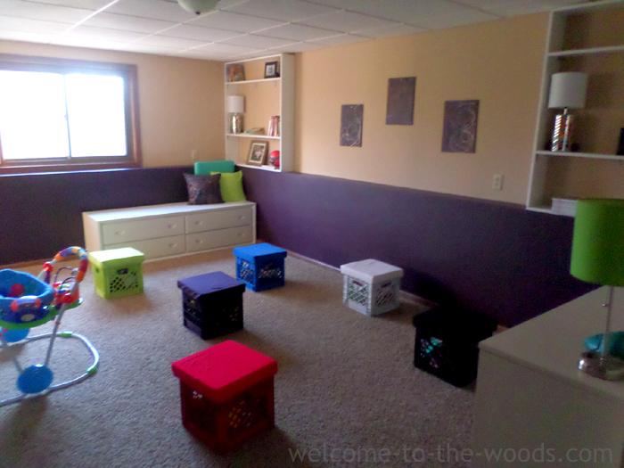 Colorful and cheerfyl basement design for a kids playroom.