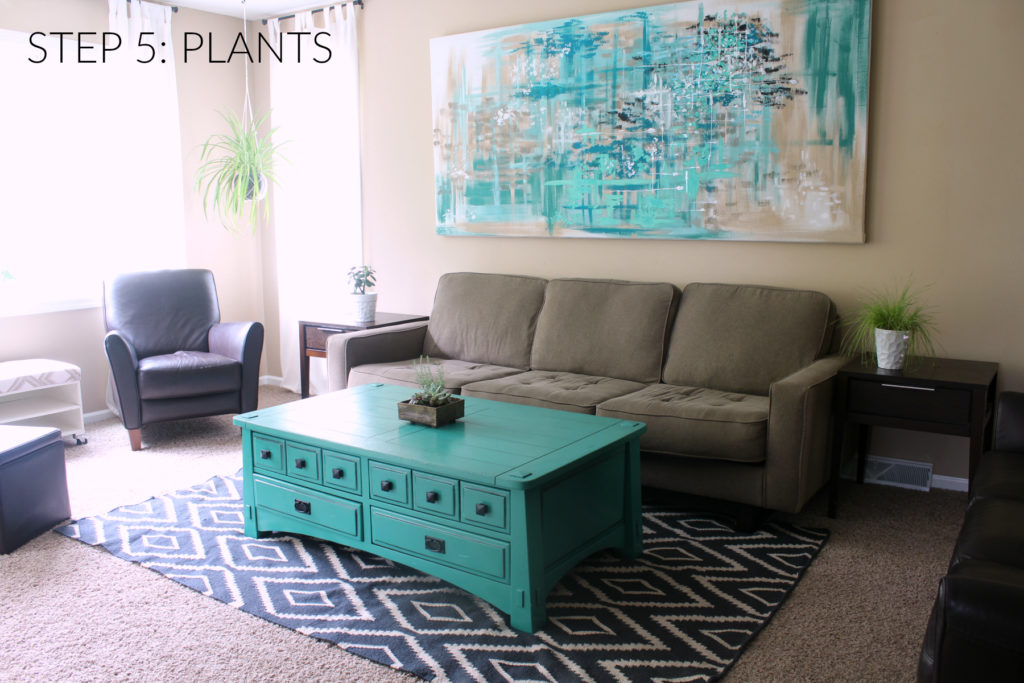 Step 5 in designing a room is adding plants to breath life into the space. The green is considered a neutral in design and is easy to pair with any color.