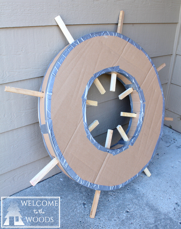 Cardboard Ship Wheel and Fake Portholes - welcome to the woods