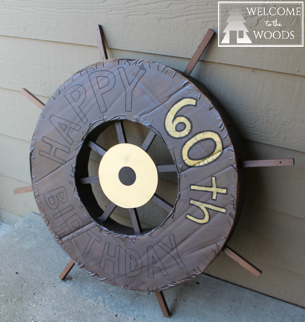 Cardboard pirate ship wheel with wood rungs. I love this idea--going to make this for my next themed birthday party!