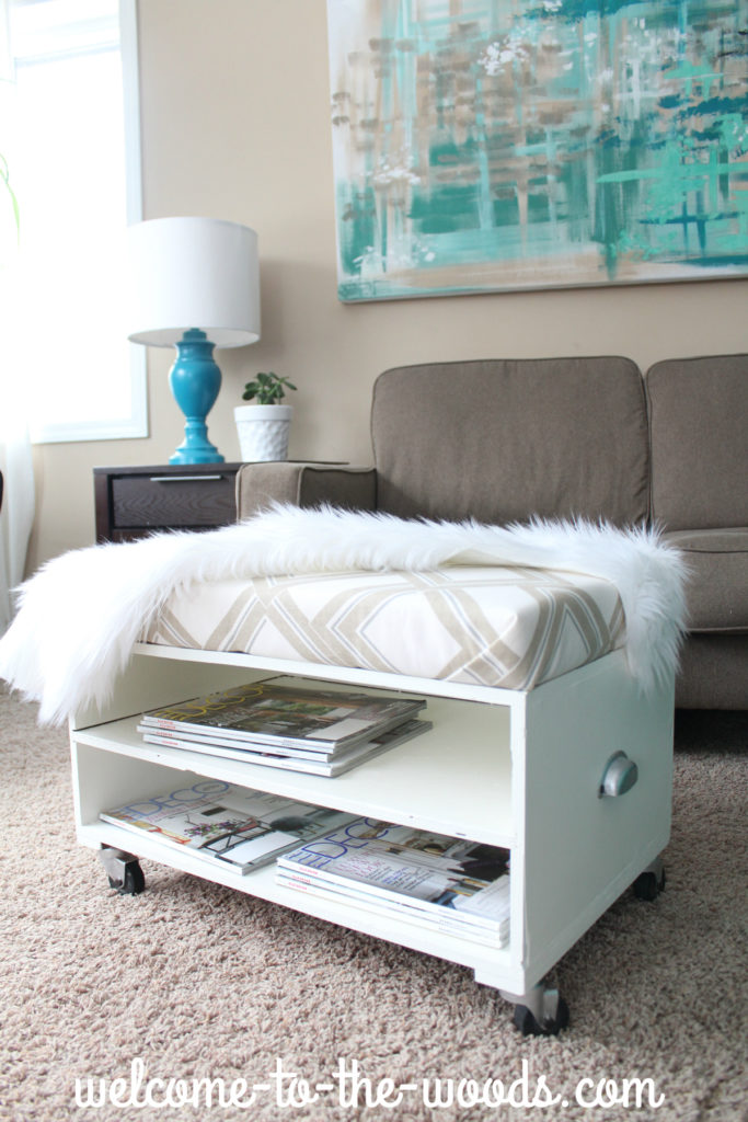 Ottoman makeover including a step-by-step tutorial for how to make a cushion that sits on top of the furniture. I love this modern, white piece and could also see it used as a bench!
