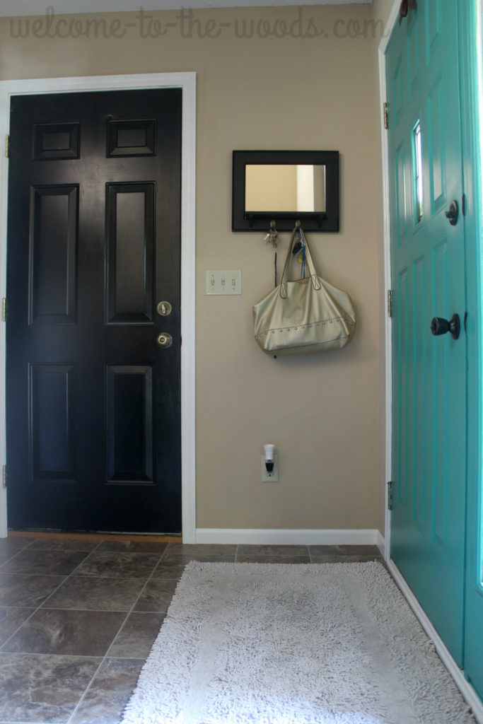 Painting your interior entryway doors a color different than the trim is a fun way to add interest to a small space.