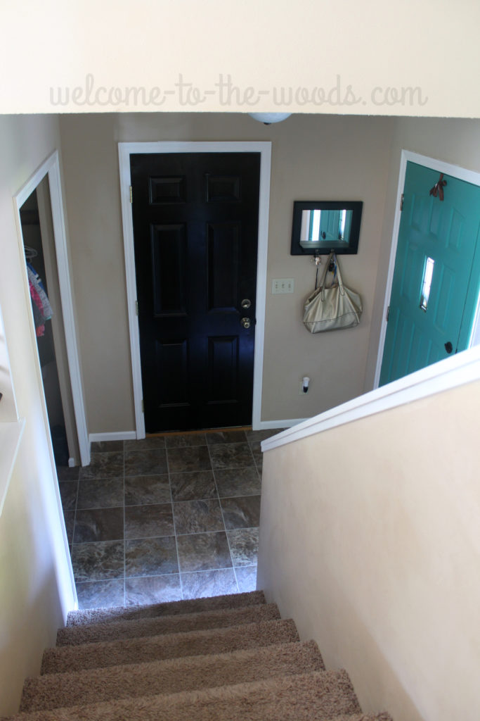 Our entryway makeover was a success! White trim, reorganized closet, and painted doors give this space a new look!
