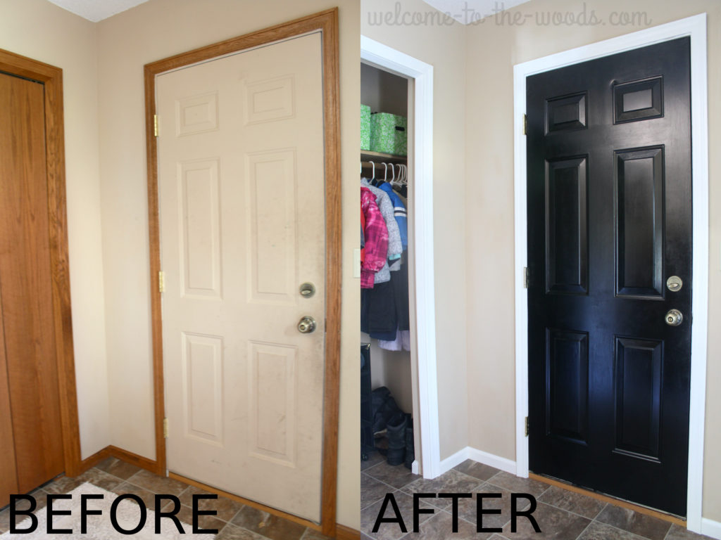 Painted trim white and door black to update entryway space and give it a modern style.