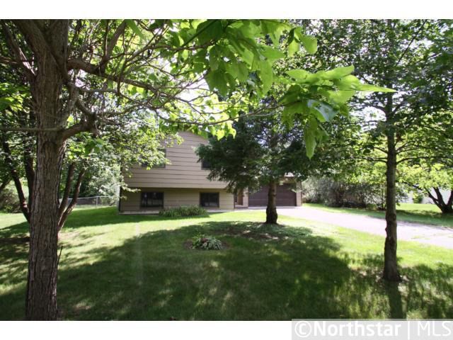 Overgrown trees removed to improve curb appeal.