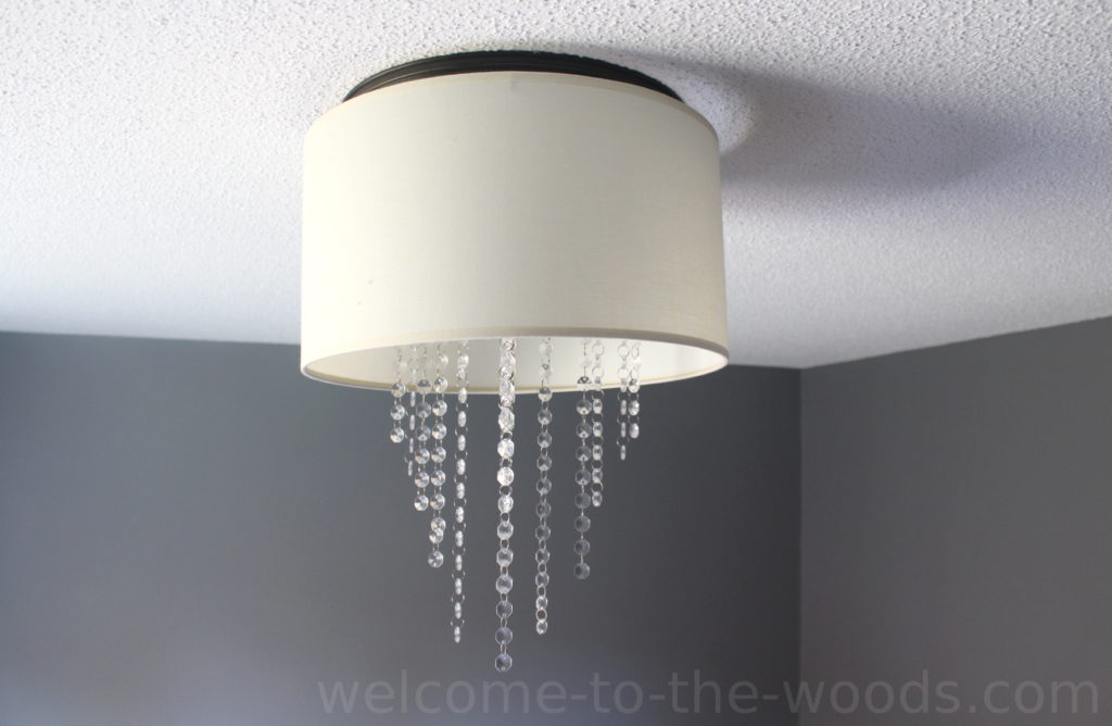 Modern drum lamp shade turned crystal chandelier! I love this diy project!