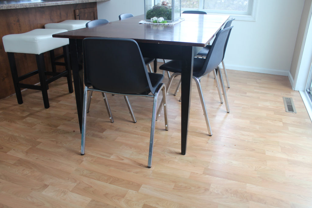 My old laminate flooring needed replacing. See my DIY solution here!