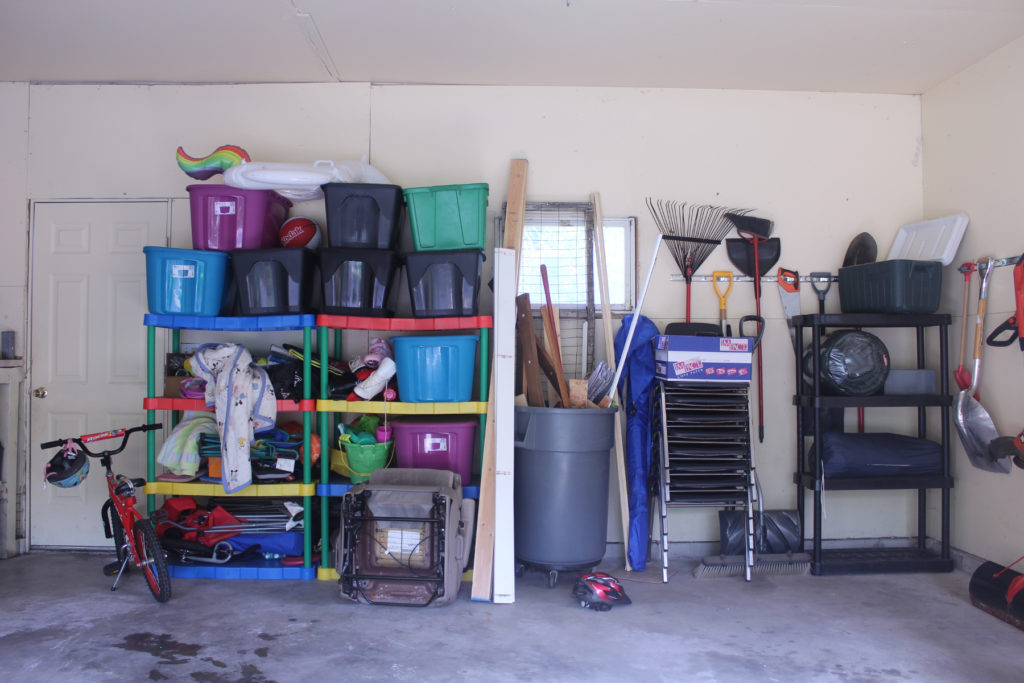 Garage clutter solved with a unique approach to building in garage shelving storage