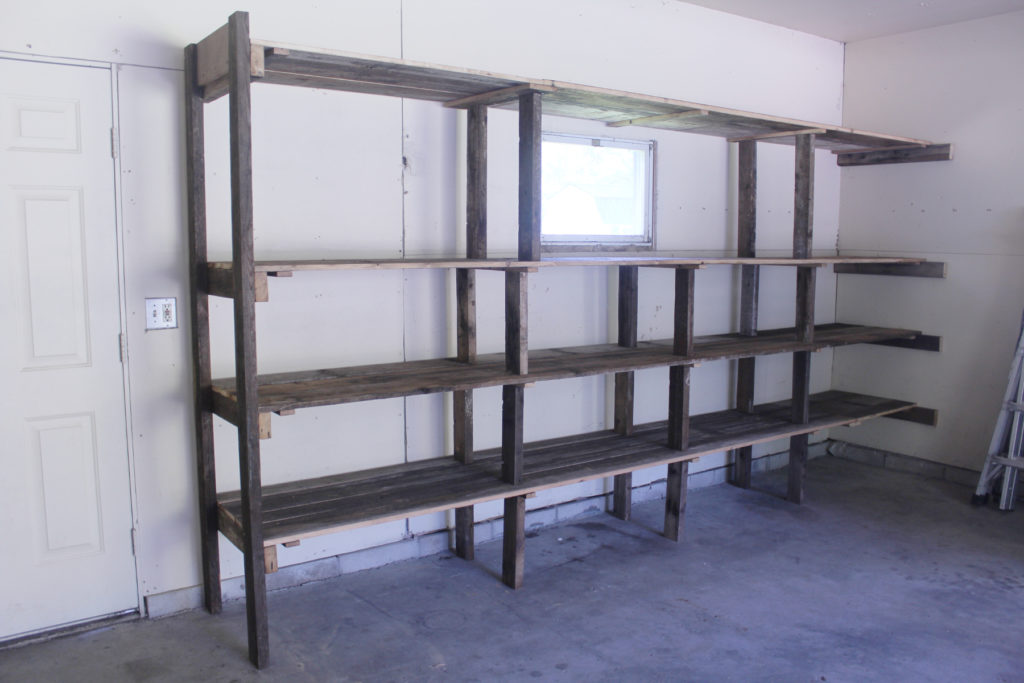 Unique design for DIY garage shelving with reclaimed wood. Lots of strength using a minimal amount of lumber.