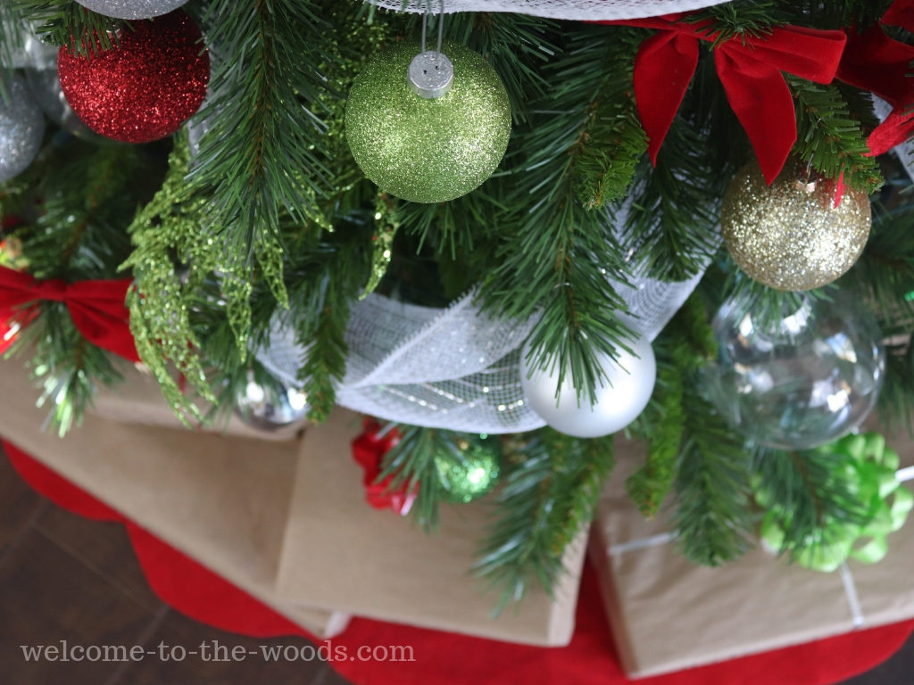 Simple brown paper wrapped presents work with any color tree ornaments from neutral to colorful. 