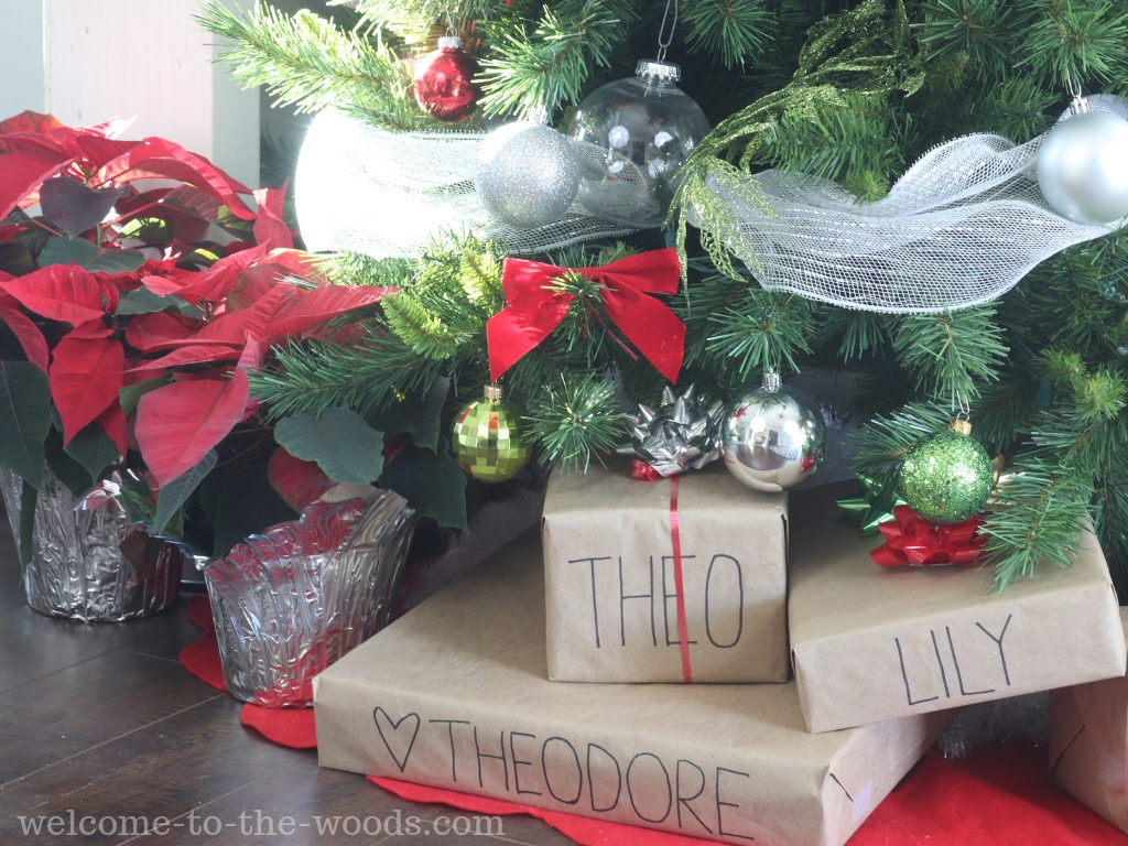 Hand lettered presents on plain brown paper wrapping. I love this personalized touch for Christmas!