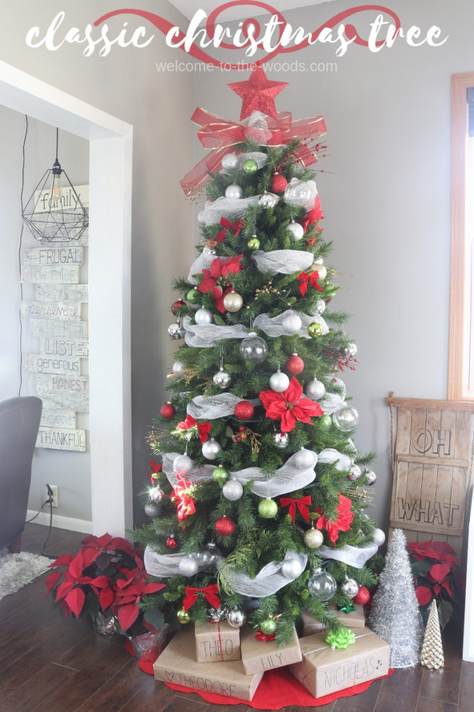 Our Christmas tree is tall and skinny, decorated with a classic red and green and metallic ornaments