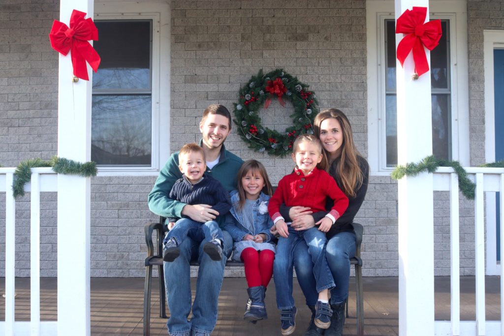 Beautiful front porch Christmas family photo