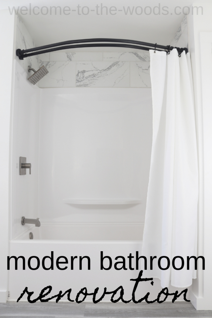 This modern bathroom renovation features a lot of white, airy and bright aesthetics with pops of black hardware. This double curved shower rod is exactly what I want in our tub shower surround!