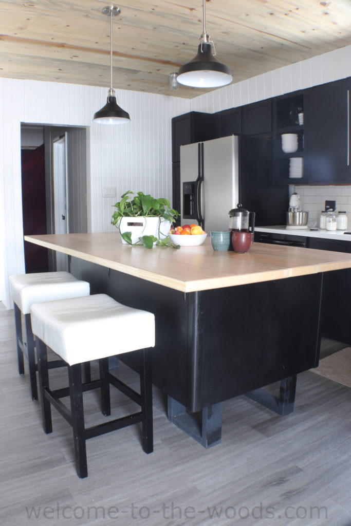 Black cabinetry white accented kitchen modern style old farmhouse update makeover