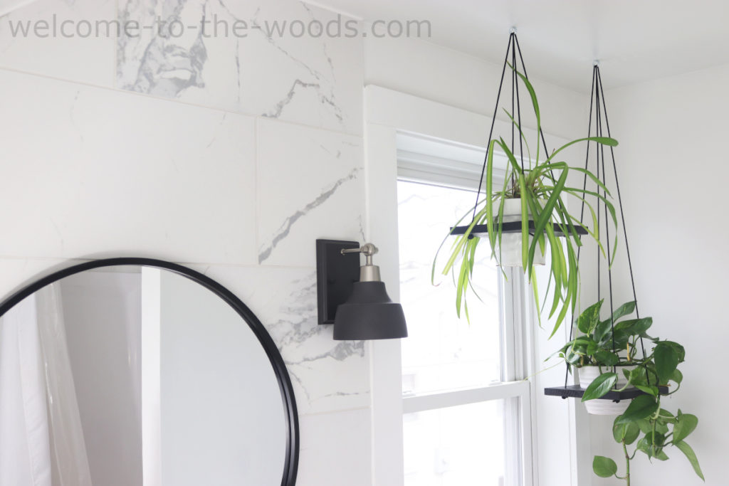 Plant hangers that are modern black wooden and easy