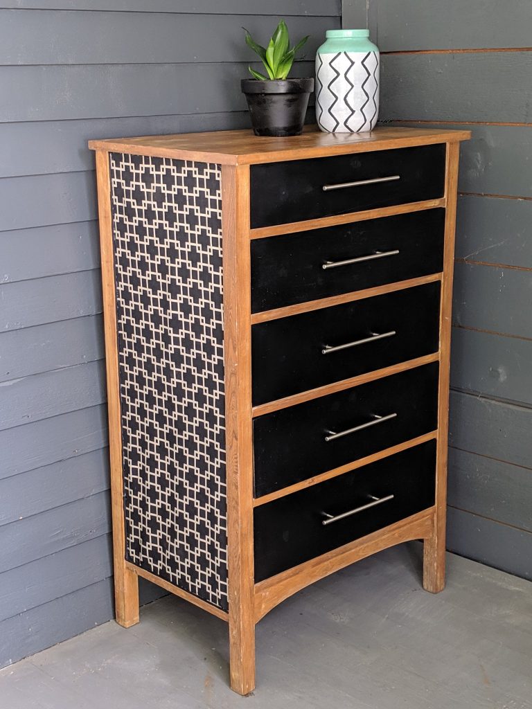 Modern Dresser DIY Redo. Dresser makeover from old, dilapidated wood chest of drawers to modern, black and patterned storage chest.
