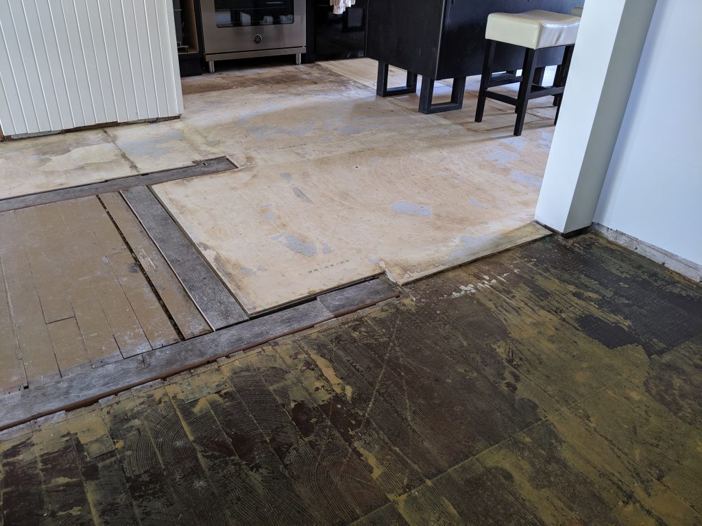 Old subfloor not level, fix with various methods, underlayment and self-leveling pour.
