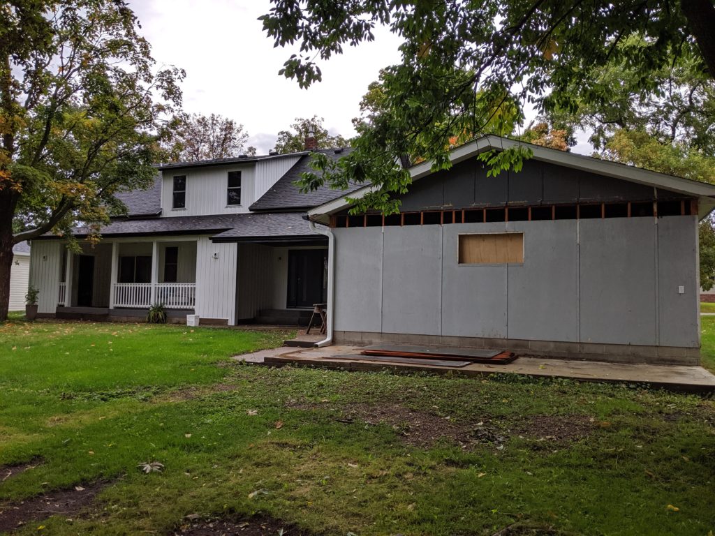 Exterior home makeover - siding done, garage just getting started!