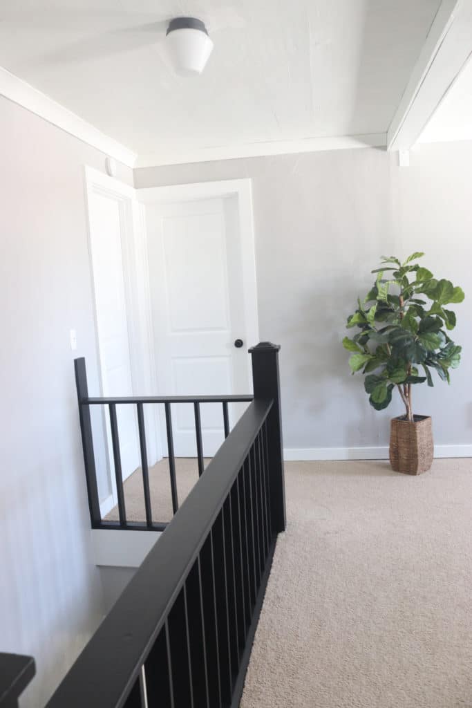Modern painted staircase remodel after photos. You will not believe what it used to look like!