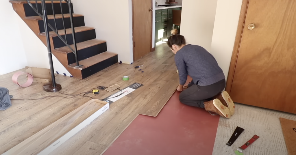 installing the same flooring in the living room that is going into the bedroom 